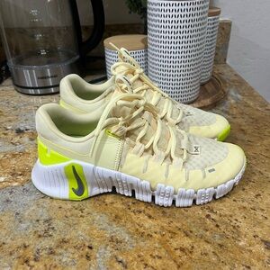 Nike Women's Yellow and White Sneakers